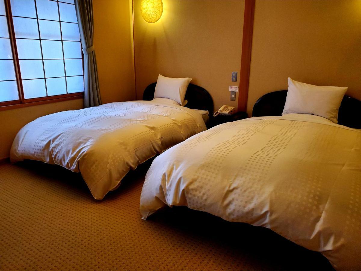 Hotel Ryotei Tanokura Yufu Zewnętrze zdjęcie